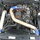 The modded and relatively clean engine bay